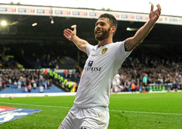 Mirco Antenucci celebrates Leeds second goal against Huddersfield Town.