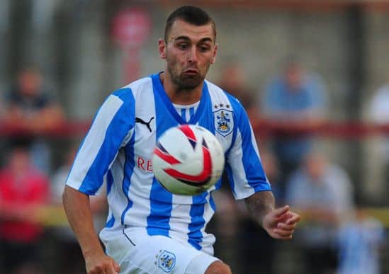 Former Huddersfield Town player Jack Hunt has joined Rotherham on loan from Crystal Palace.