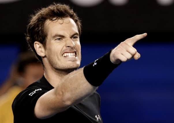 Andy Murray of Britain celebrates after defeating Tomas Berdych of the Czech Republic in their semifinal match at the Australian Open tennis championship in Melbourne. (AP Photo/Lee Jin-man)