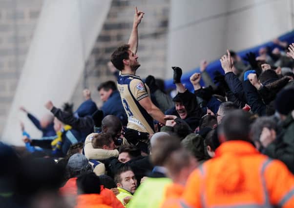 Leeds United's Billy Sharp celebrates his winner with the fans.
