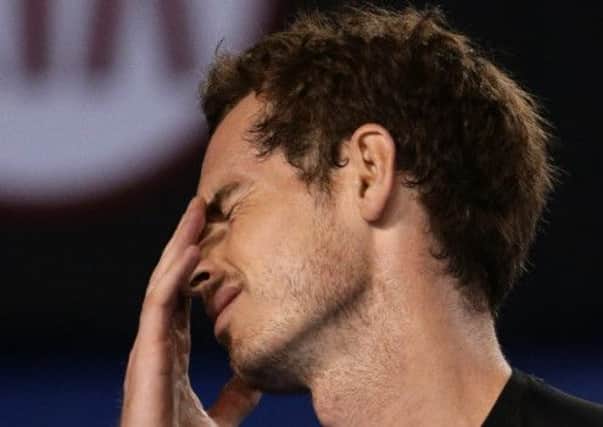 Andy Murray reacts to a lost point to Novak Djokovic of Serbia during the men's singles final at the Australian Open tennis championship in Melbourne, Australia. (AP Photo/Rob Griffith)