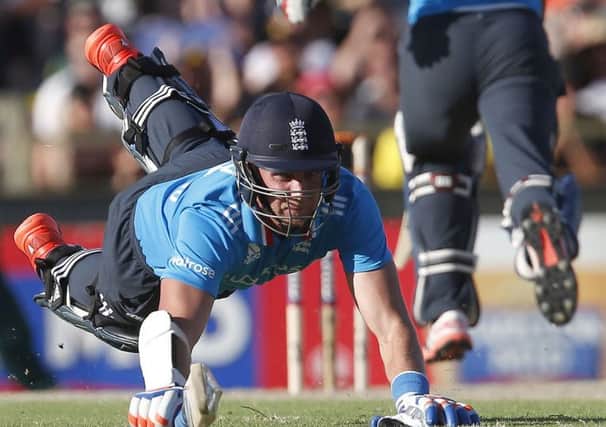England's Stuart Broad dives to make his crease during their one day international cricket match against Australia in Perth