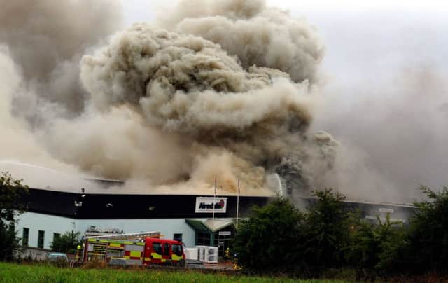 6 September 2013...    Firefighters tackle a major blaze at Airedale air conditioning factory on the A65 Leeds Road in Rawdon