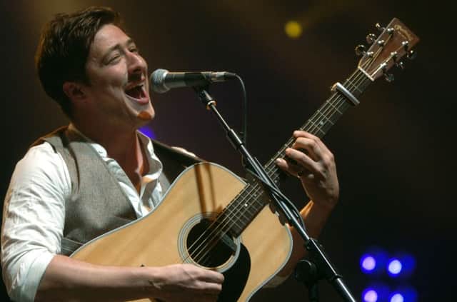Marcus Mumford of Mumford & Sons on stage at Leeds Festival in 2010.