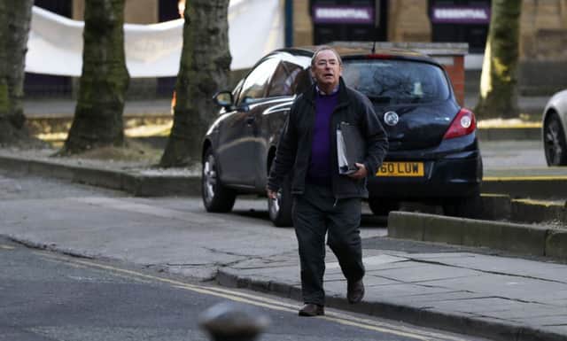 Former television weather presenter Fred Talbot arrives to start giving his evidence at Manchester's Minshull Street Court