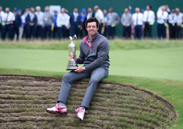 Rory McIlroy with the Claret Jug after winning the 2014 Open Championship at Royal Liverpool Golf Club, Hoylake. The Open will be screened on Sky from 2017.