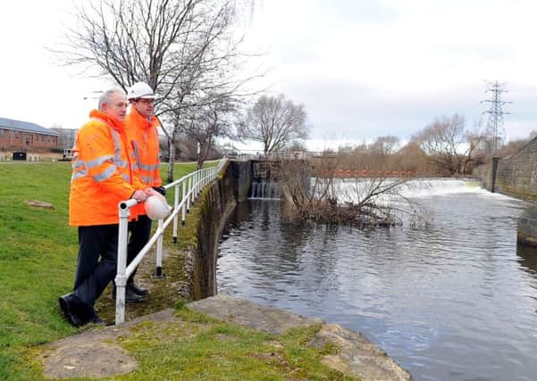 Councillor Keith Walker, Leader of Leeds City Councill, with Andy Judson, from BMMJV, near Knostrop Weir