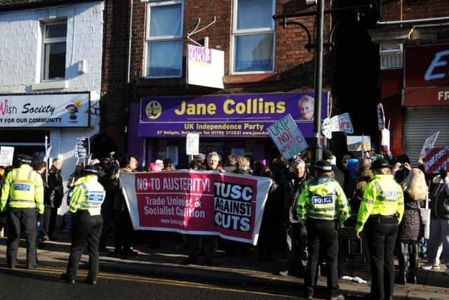 Crowds gather outside the UKIP office in Rotherham where UKIP leader Nigel Farage was meeting with parliamentary candidate Jane Collins, in Rotherham.