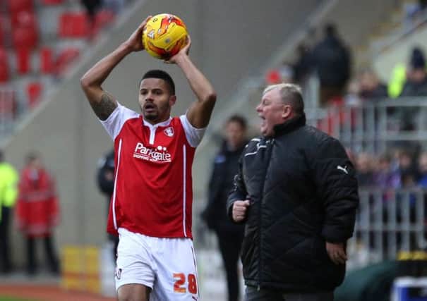 Rotherham United's manager Steve Evans says Zeki Fryers, seen taking a throw-in, has improved with every game (Picture: Paul Wickson).