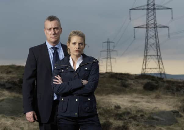 DCI Banks, played by Stephen Tompkinson with DS Annie Cabbot, alias Andrea Lowe