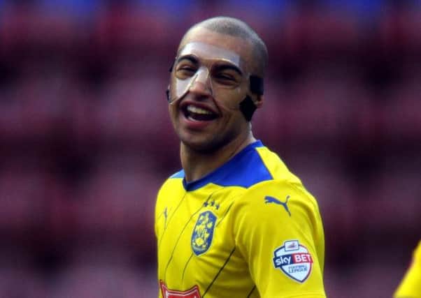 Striker James Vaughan is smiling through the pain for Huddersfield Town (Picture: James Hardisty).