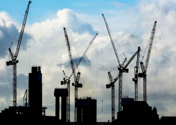 A general view of construction cranes on the London skyline.  Gareth Fuller/PA Wire