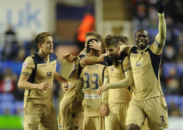 Sol Bamba, right, leads the celebrations for Luke Murphy's goal which set Leeds United on their way to victory over Reading on Tuesday night (Picture: Bruce Rollinson).