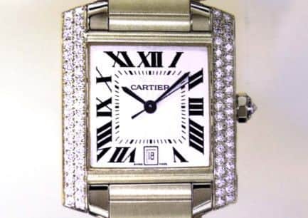 The distinctive Cartier watch that was stolen from him which was platinum with rows of diamonds either side of the face.