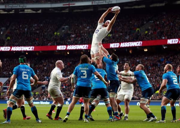 England's Dave Attwood wins a lineout.