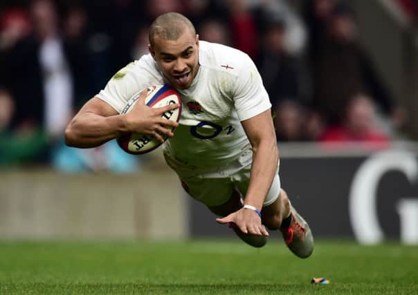 England's Jonathan Joseph scores their second try against Italy