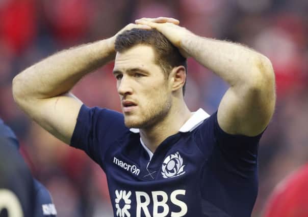 Scotland's Tim Visser looks dejected at fulltime