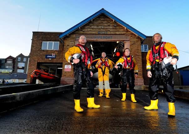 RNLI Scarborough crew members (left to right) Chris Moss, Dave Horsley, Adam Beston, and Carl Walsh.