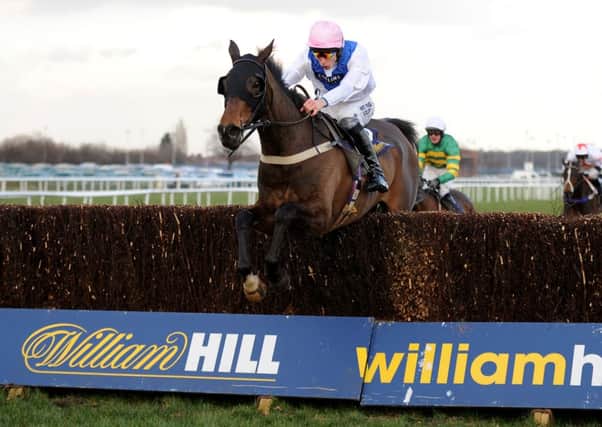 Night In Milan, ridden by James Reveley, seen jumping the last on the way to winning The William Hill Grimthorpe Chase Handicap Steeple Chase at Doncaster last March (Picture: Nigel French/PA Wire).