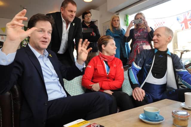 Nick Clegg and Gary Verity meet cyclists at the Amici and Bici cafe in Sheffield