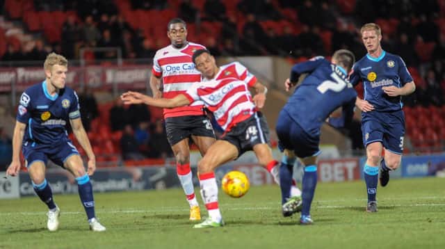 Doncaster Rovers Nathan Tyson battles for possession during last nights 2-1 victory over Crewe Alexandra in League One. Picture: Steve Uttley