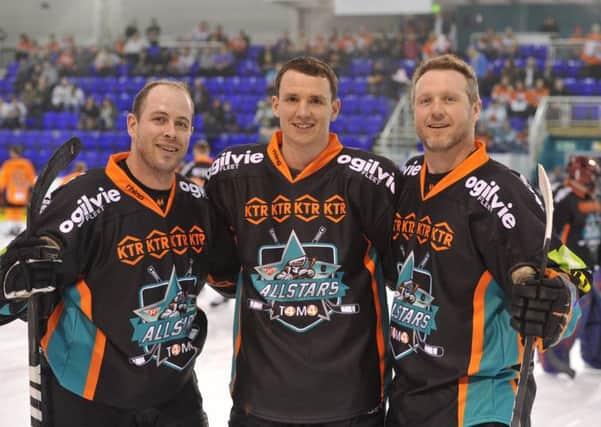 AIMINGH HIGH: Sheffield Steelers' Mark Thomas, pictured with former team-mates Randy Dagenais, and Steve Munn who returned for his testimonial game on Turesday night. Picture: Dean Woolley.