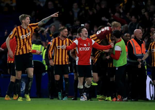 Bradford City's players celebrate at Chelsea after their 4-2 win, one of two giant-killing victories in the FA Cup. But the BBC have still opted against showing their quarter-final tie live.