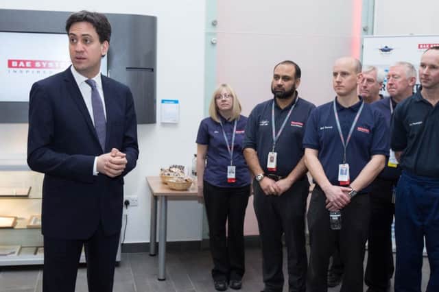 Ed Miliband meets employees during a visit to BAE Systems in Samlesbury, Lancashire.