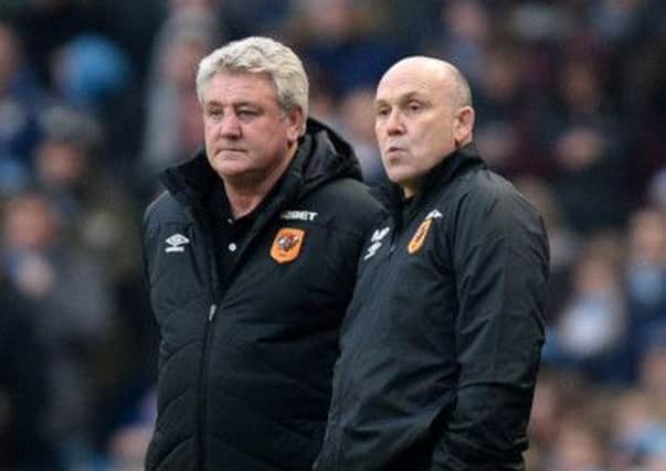 Hull City manager Steve Bruce, left, with his new assistant Mike Phelan (Picture: Martin Rickett/PA Wire).