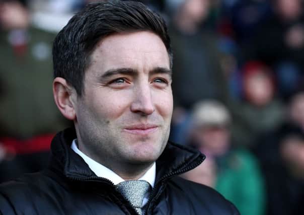 Oldham Athletic manager Lee Johnson is the bookies' favourite for the Barnsley job.