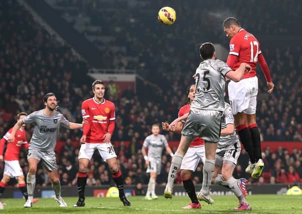 Chris Smalling scores the second of his two headed goals for Manchester United in Burnleys 3-1 Premier League loss at Old Trafford (Picture: Martin Rickett/PA).