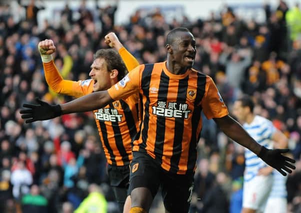 Hull City'ss Dame N'Doyle and Nikica Jelavic celebrate his goal.