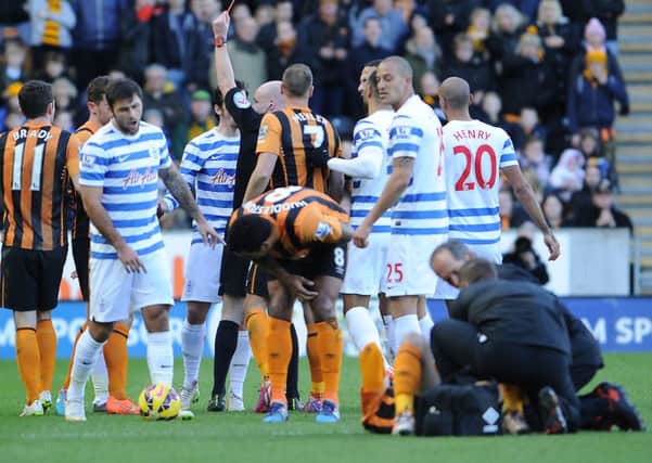 Referee Anthony Taylor sends off QPR's Joey Barton as QPR lost 2-1 to Hull City at the KC Stadium (Picture: Ryan Browne/PA Wire).