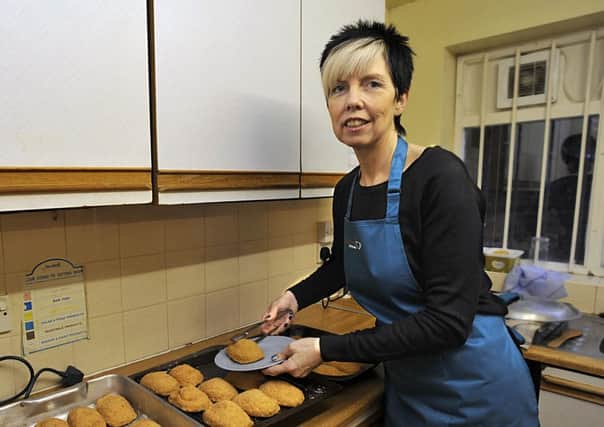 Corrina Young preparing food at St George's Community Hall, Harrogate.