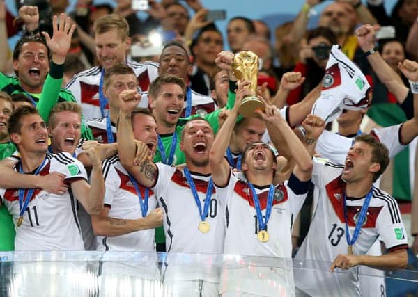 Germany's Philipp Lahm lifts the World Cup