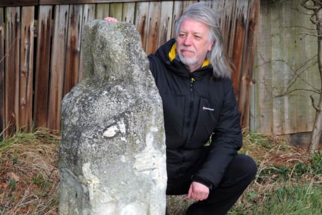 York city archaeologist John Oxley by the Plague Stone on Hob Moor
