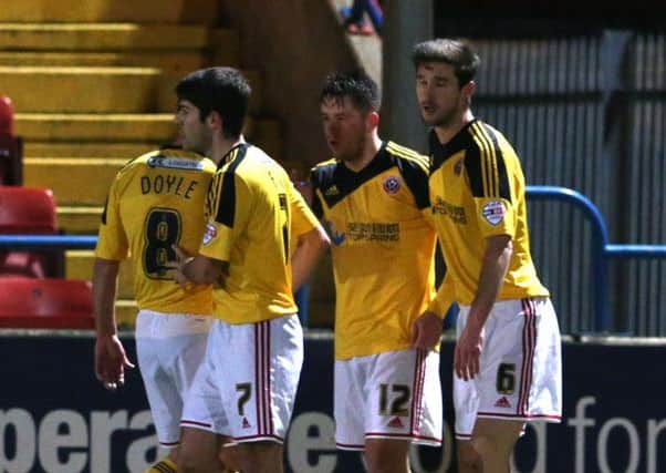 Sheffield United celebrate opening the scoring at Rochdale through 
Marc McNulty (Picture: Martyn Harrison)