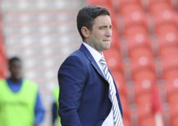 Doncaster Rovers v Oldham Athletic
Oldham boss Lee Johnson looks on