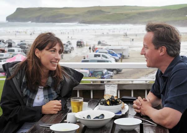 Prime Minister David Cameron and his wife Samantha.