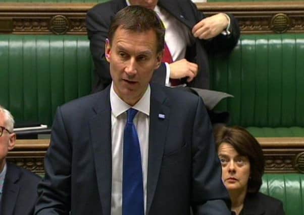 Health Secretary Jeremy Hunt makes a statement to MPs in the House of Commons, London following the publication of the report regarding Jimmy Savile's actions at Stoke Mandiville Hospital