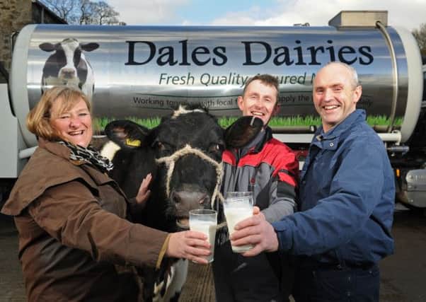 Heather Parry, of Fodder, farmer Mark Smith and David Oversby, of Dales Dairies, at Rookery Farm