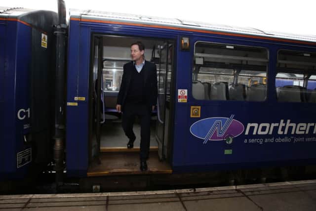 Nick Clegg during a visit to Sheffield train station.