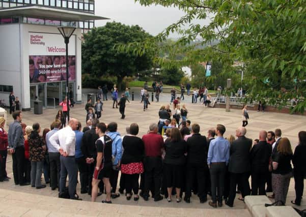 New students at Sheffield Hallam University: Staff preparing for their new term photo