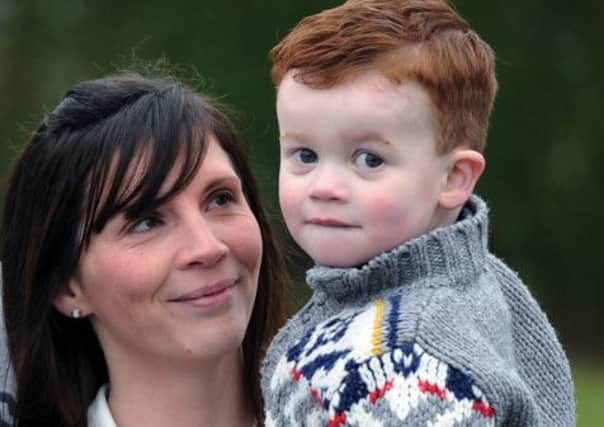 Two-year-old Blake Taylor with his mum Hollie Evans. Picture Jonathan Gawthorpe