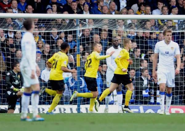 Leeds players show their frustration after Watford's equaliser.