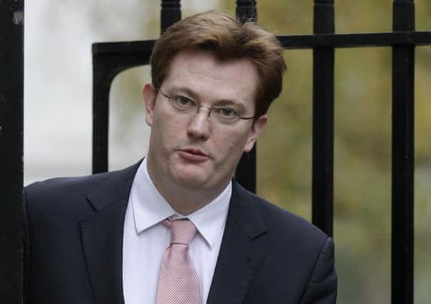 Danny Alexander, Britain's No. 2 Treasury official, leaves 11 Downing Street in London