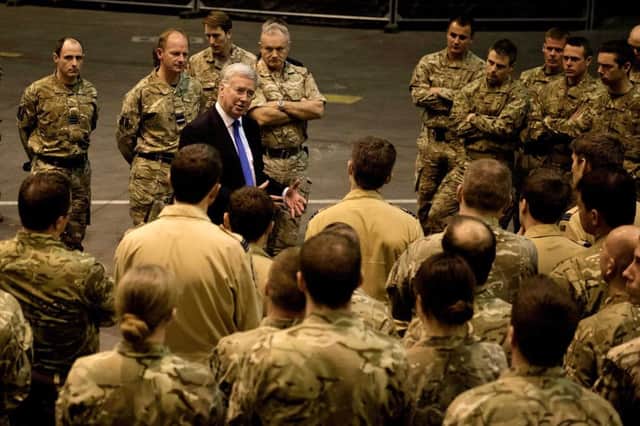 Defence Secretary Michael Fallon praises the 400 British military personnel for their work in fighting Islamic State (IS) extremists during a visit to RAF Akrotiri in Cyprus.