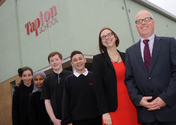 Tapton School co headteachers Claire Tasker and David Dennis celebrate with pupils. Picture: Andrew Roe