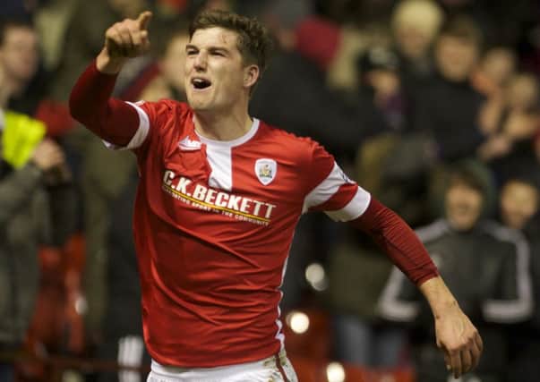 Barnsley' s George Waring celebrates after putting them ahead at Oakwell

. Picture: Dean Atkins.
