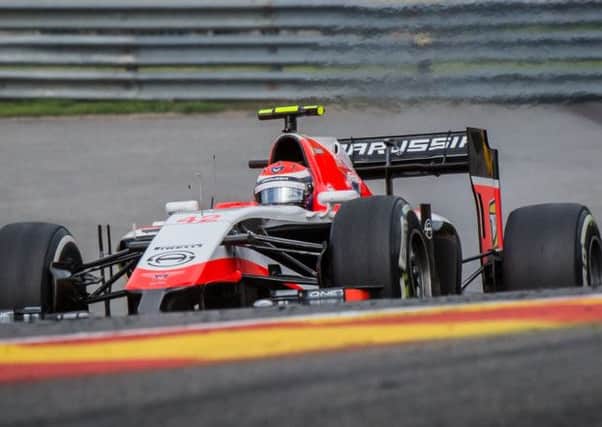 DRIVING BACK: Marussias Alexander Rossi in action during first practice ahead of last years Belgian Grand Prix. Picture: AP Photo/Geert Vanden
